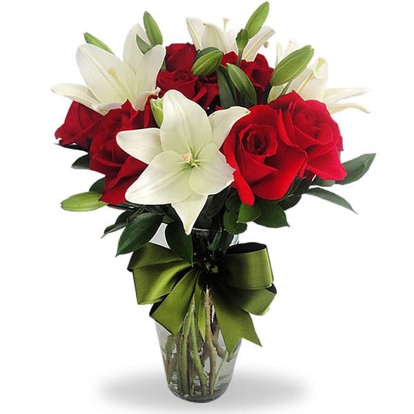 Florero con lilys y 12 rosas rojas